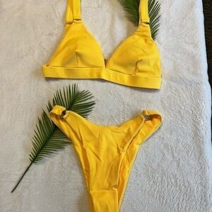 Brand new two (2) piece bikini, swimsuit. Medium and Large Sizes.